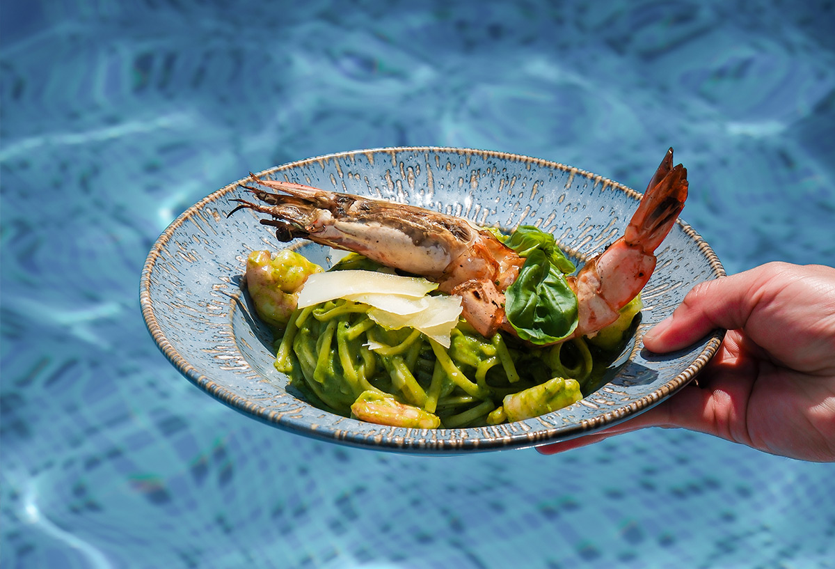 Guest enjoying lunch at the beach club