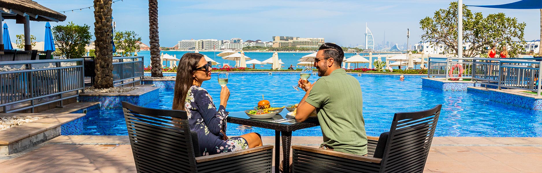 Riva Beach Club pool and beach view